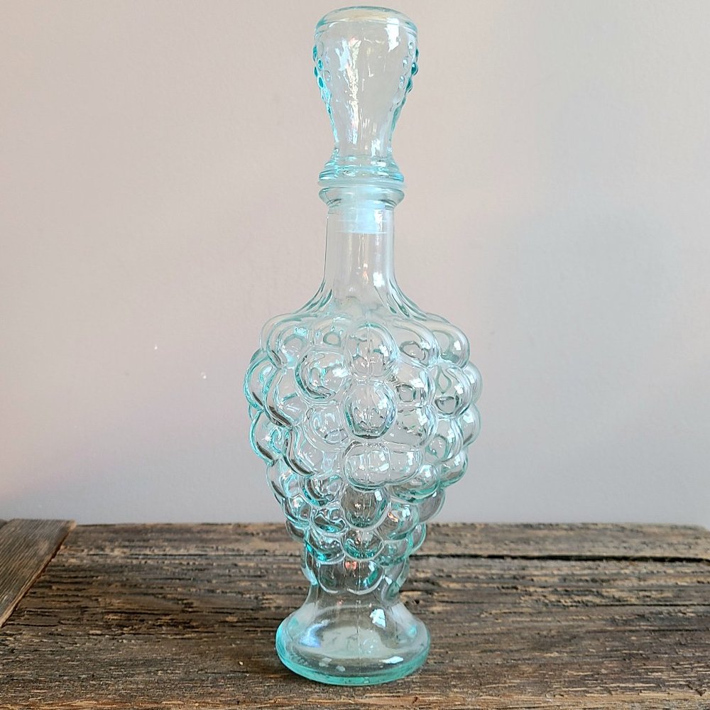 Vintage green glass decanter carafe grape shape with lid.